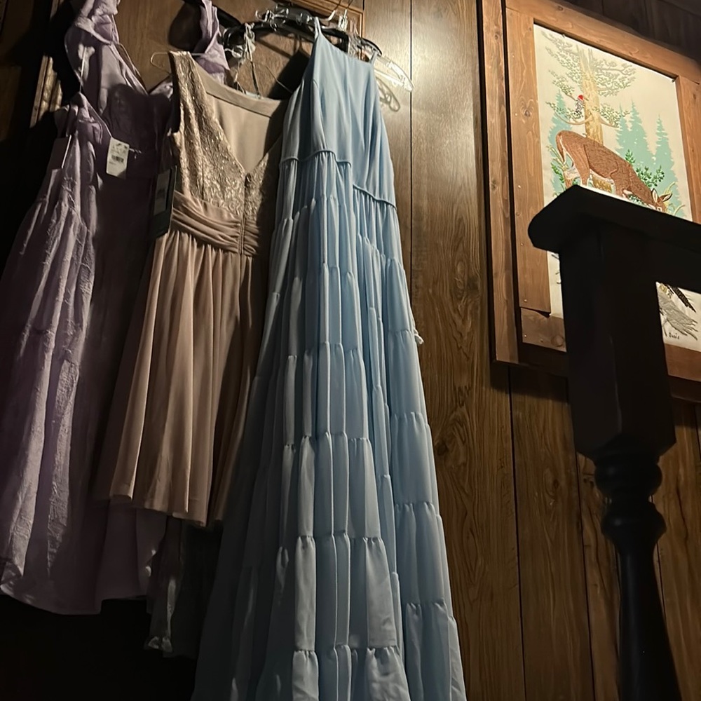Beautiful long sheer baby blue sleeveless flowing dress with tiers of fabric